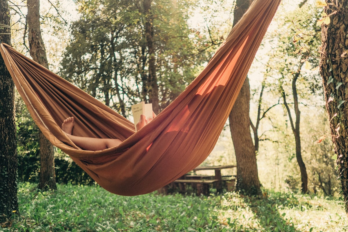 Woman Relaxing in Hammock